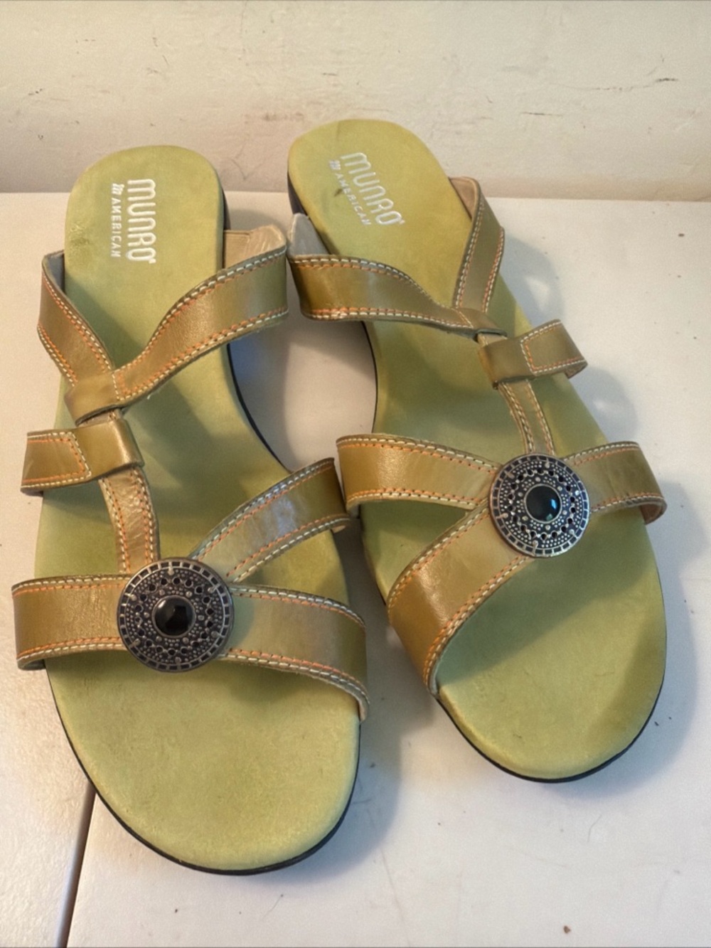 Munro Olive Green Leather Slide Sandals with Silver Medallions